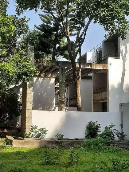 The design for the married students' housing carefully integrates with the surrounding trees, with structures built around and under the existing canopy.