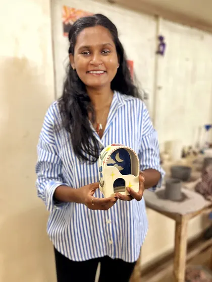 Exploring all four techniques, this student created a whimsical collection in her beginner's course, including a night-sky luminary, a cupcake jar, and a mug with a face.