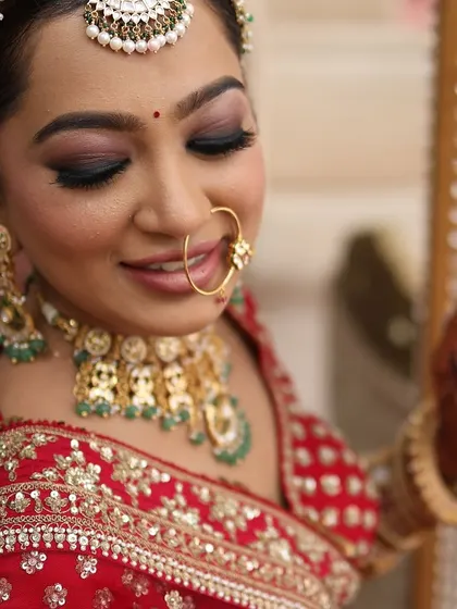 A close-up on the eye makeup for this traditional bridal look. We opted for a soft smoky eye with a defined lash line to make her eyes pop, paired with a classic matte lip.