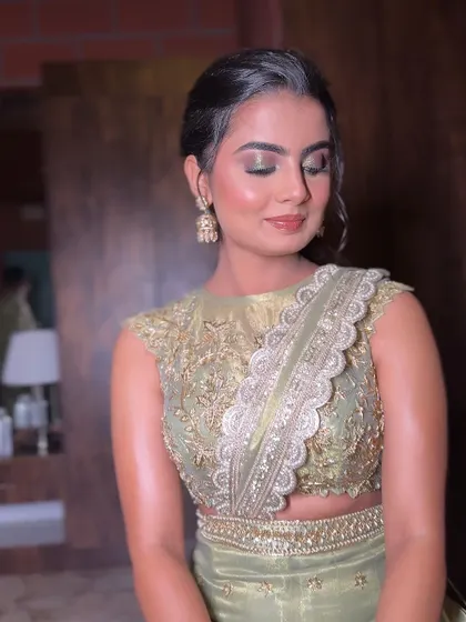 A client ready for her event, wearing our elegant earrings and bangles. Sometimes, less is more, and a few well-chosen pieces can make all the difference.