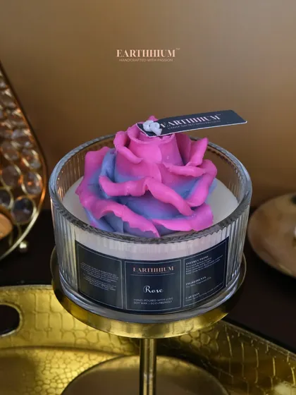 A two-toned rose votive, blending pink and purple for a unique and beautiful effect.