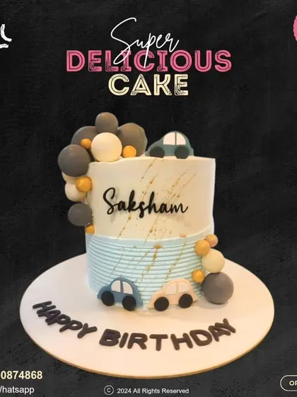 A sweet and stylish birthday cake for Saksham. This design features a modern striped pattern, a cascade of spheres, and cute little cars, perfect for a little one's celebration.