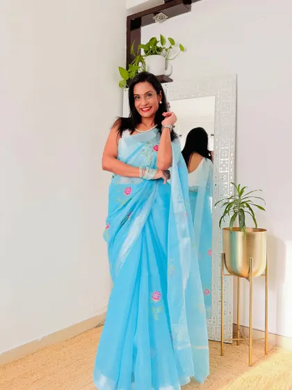 This sky blue embroidered Kota Doria saree from Meesho is a steal for just 450 rupees. The fabric is light and airy, and the embroidery adds a touch of elegance.