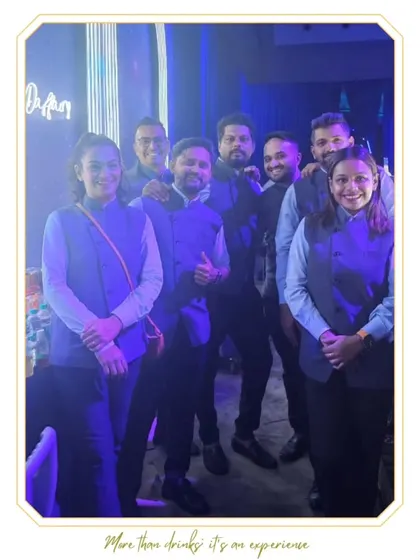 Another shot of our professional team at the Kochi wedding, showcasing their coordinated and sharp appearance.