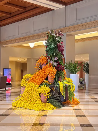Drenched in festive hues and marigold magic. This photo captures the full installation, a golden tribute to the spirit of celebration.