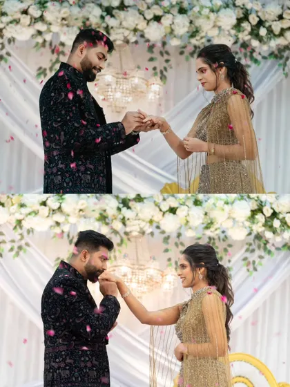 The ring exchange, the pivotal moment of the engagement ceremony. The couple is showered with flower petals as they make their commitment to each other.