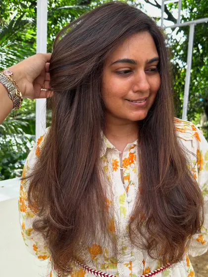 Are you even birthday ready if your hair ain’t done? This transformation involved covering significant grey regrowth and blending it into a rich, youthful brunette color with a fresh cut.