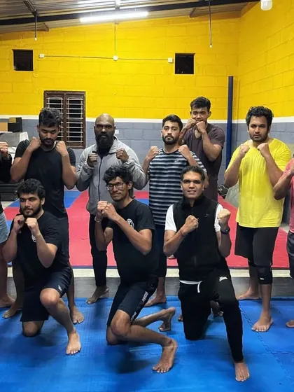 The team posing after a great session. This is the supportive environment we've built, where everyone is welcome and encouraged to be their best.
