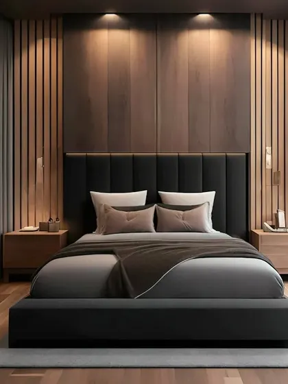 We used dark wood paneling and a black upholstered headboard to create a moody and sophisticated bedroom. The warm accent lighting from the bedside lamps enhances the cozy atmosphere.