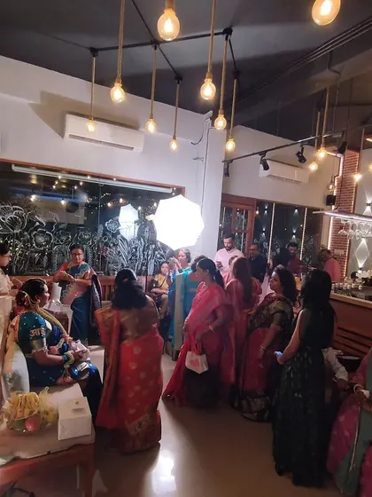 Guests mingling and enjoying the warm, intimate atmosphere of this baby shower. I work to create a vibe where everyone feels comfortable and connected.