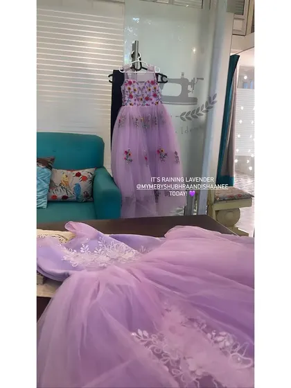 We love working with soft, dreamy colors. Here you can see two of our lavender creations for Baby MYME, one with delicate floral embroidery and another with intricate white applique work on tulle.