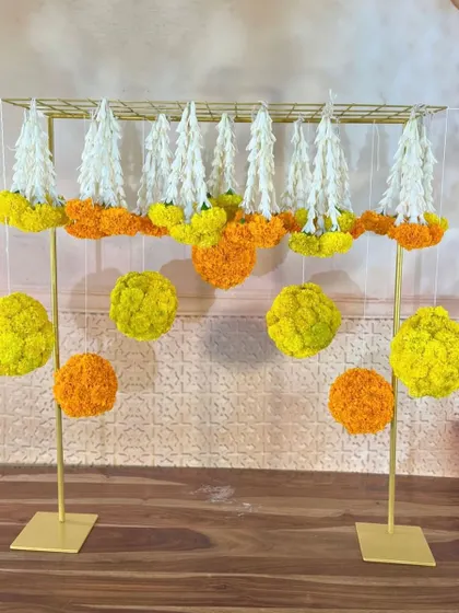 This is a great example of modern Indian decor. The clean lines of the golden frame contrast beautifully with the traditional floral elements.