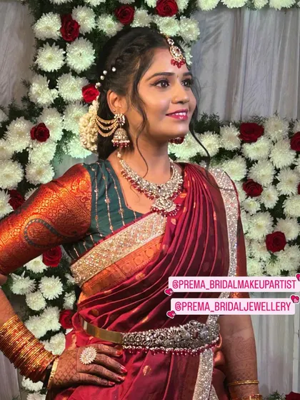 A client looking beautiful in a ruby and diamond-look set for her event.