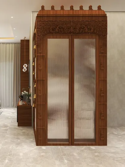 The 3D visualization for the grand puja unit in 'Muditā', detailing the intricate carvings and fluted glass doors.