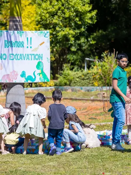 A 'Dino Excavation' activity where children could dig for dinosaur fossils, providing a fun, hands-on, and educational experience.