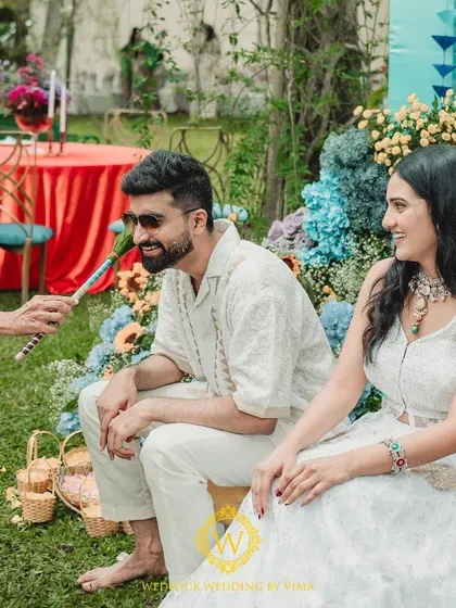 We designed this Haldi and Mehendi with multiple unique color palettes. The decor featured everything from stunning yellow and blue floral arrangements to lively orange accents for a truly dynamic celebration.