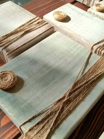 Our photo blocks in the making. Each one is hand-sanded and painted to create a unique, rustic finish, ready to hold your precious moments.
