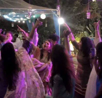 The bride and her friends enjoying the music.