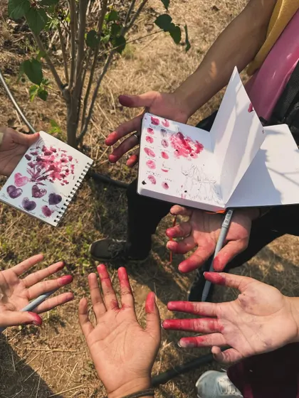 Sometimes art gets messy! Using natural pigments from flowers to create colors in my sketchbook.