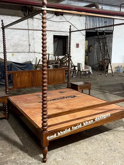 A classic four-poster canopy bed with intricately turned posts, handcrafted in my workshop. This design is perfect for boutique hotels aiming for a touch of colonial elegance.