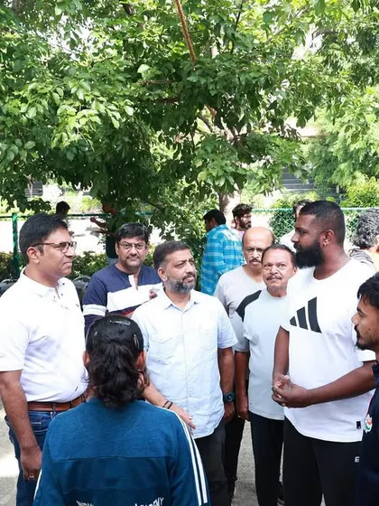 Our head coach speaking with MLA C.K. Ramamurthy and our athletes, discussing the future of training at the newly renovated stadium.