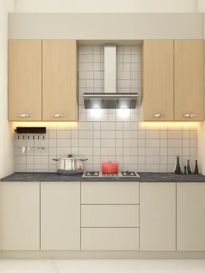 This straight-line kitchen design is ideal for smaller spaces. It features a two-tone cabinet design with natural wood-finish uppers and neutral lowers, complemented by a simple white tile backsplash.