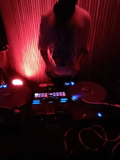 Another angle from my 90's hip hop set at Social. The setup with two turntables and a mixer is my command center for creating a vibe and taking the crowd on a journey through different sounds.