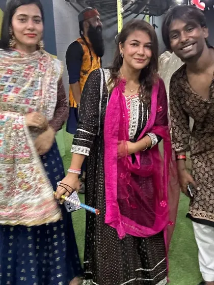 Friends and members posing for a photo during our Navratri Dandiya event. It's all about the community spirit.