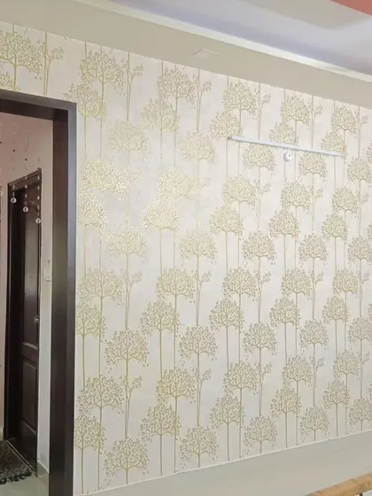 Another view of the simple tree pattern wallpaper, showing how it can be used to create a cohesive look across a larger area.