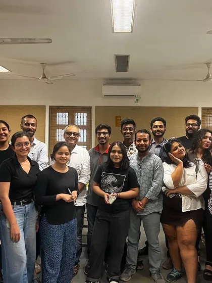 The group of engaged students and mentors at the end of a successful printmaking workshop. The sense of community and shared discovery is a vital part of the architectural studio culture I promote.