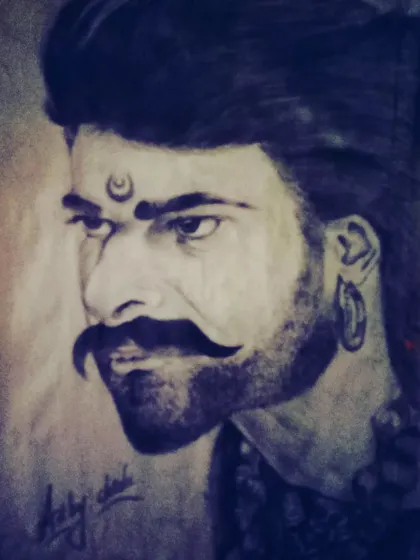 A charcoal sketch of actor Prabhas in his iconic role from the movie "Baahubali". The dramatic lighting and expression were my main focus in this piece.