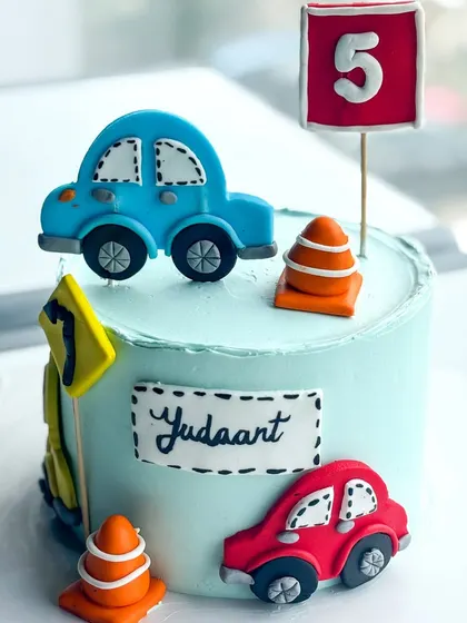 Another shot of the 5th birthday car cake, showing the cute fondant details.