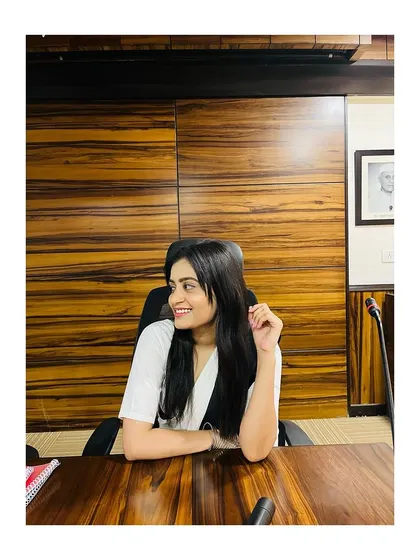 A smile of satisfaction at my desk. Being a self-made lawyer means every success is built on a foundation of personal effort and resilience.