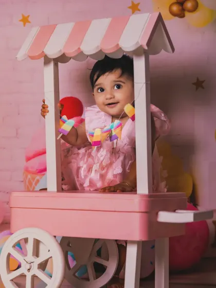 A playful peek from inside the candy cart.