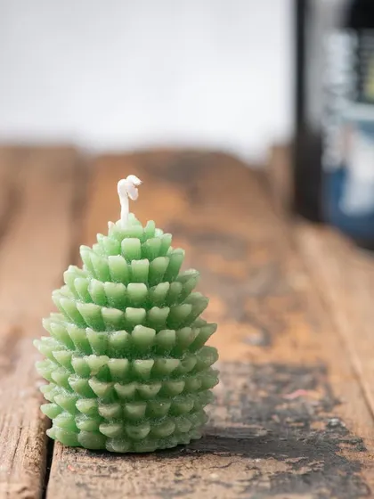 A light green version of my pinecone candle, perfect for a more subtle and natural holiday color scheme.