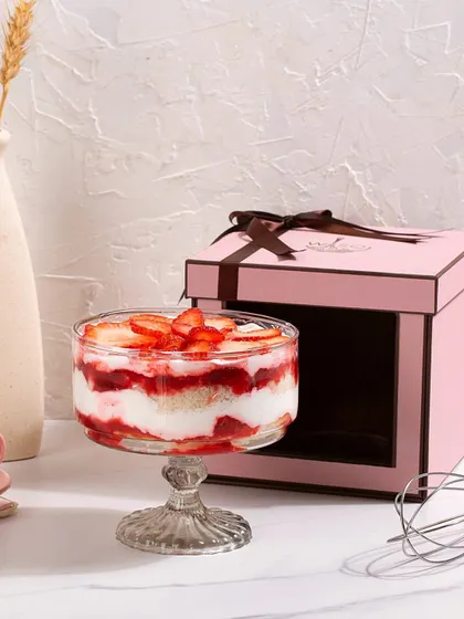 Our Strawberry Cream Cheese Trifle, another seasonal delight, ready for gifting in our signature pink window box.