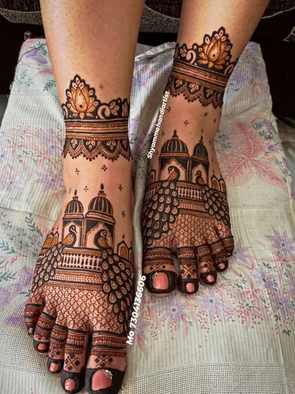 I create elaborate and clean mehandi designs for feet, featuring traditional architectural and peacock motifs that provide a complete and elegant bridal look.