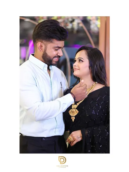 The couple shares a loving gaze in this candid shot, capturing the intimacy and affection between them during their celebration.