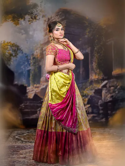 A full-length shot of the model against a historical backdrop, giving the image a timeless and artistic feel.