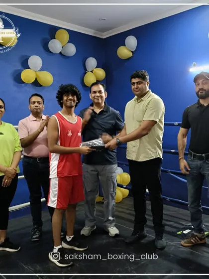 A moment of recognition for one of our dedicated young boxers. We foster an environment where hard work is celebrated and every member feels valued.