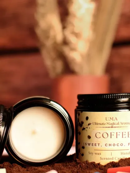 An open 'Coffee' candle, showing the clean, smooth top of the hand-poured soy wax. This scent is incredible for coffee lovers.