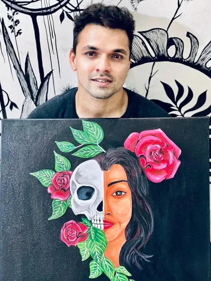Holding up my finished symbolic painting. It's rewarding to see an idea that started in my head become a tangible piece of art.