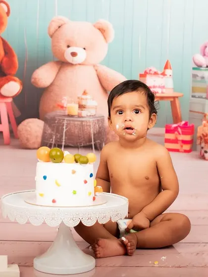 That priceless expression when they get cake on their face for the first time. A cake smash session is all about capturing these genuine, funny moments.