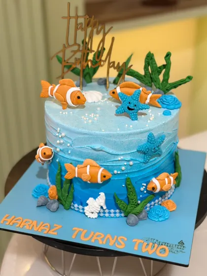 Pool vibes, but make it cake! Our summer-themed cakes bring the sunshine to your party, with designs featuring beach scenes, ocean waves, and fun caravan toppers.