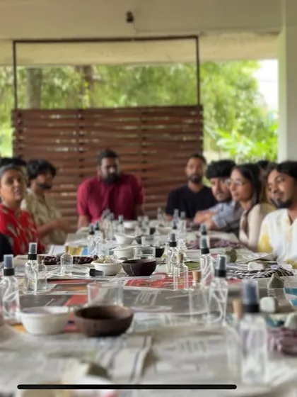 A long-table view of our team during a creative workshop, fully absorbed in the task at hand.