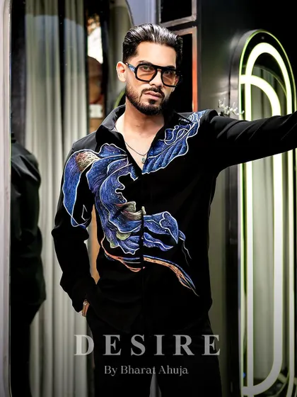 Commanding presence, bold design. This shirt fuses modern art with timeless elegance, featuring abstract, hand-painted waves of blue and purple.