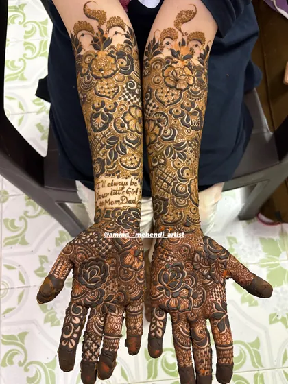 A very special request: this bride wanted a tribute to her parents, so I included the phrase 'I'll always be your little girl Mom & Dad' in her bridal mehendi.