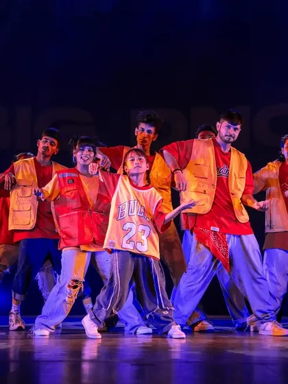 The vibrant energy of our students shining on stage. We use professional lighting and production to make sure your performance looks as good as it feels.