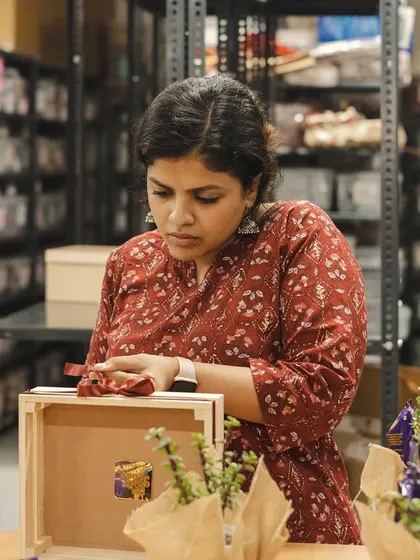 Our co-founder Sweta carefully curating one of the Women's Day hampers for Raphe. Each gift, especially those with live plants, gets special attention.