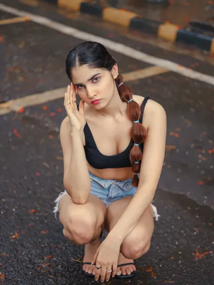 A crouching pose that adds an athletic and edgy feel.
